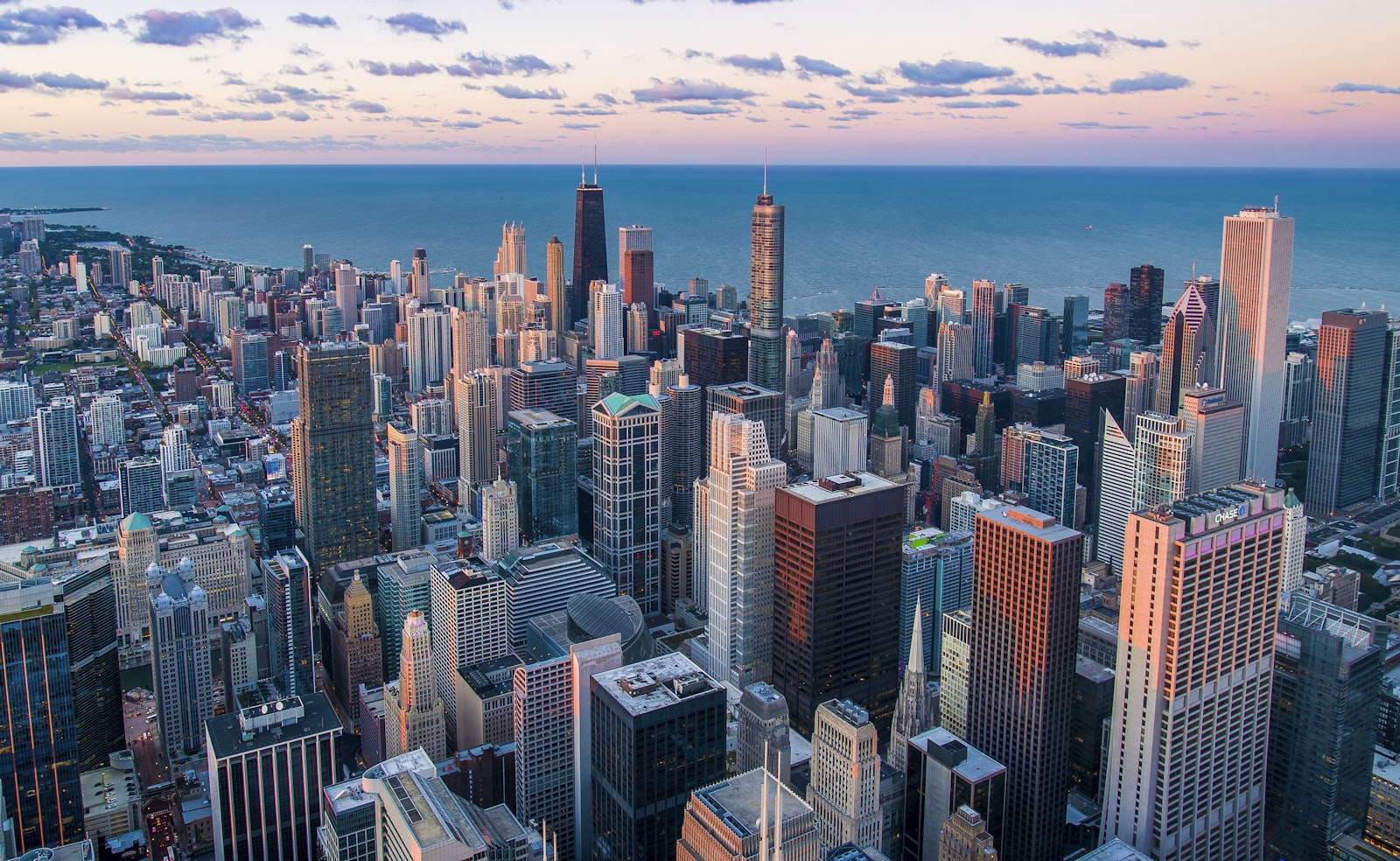 Night view of a city skyline representing the international reach of organized crime
